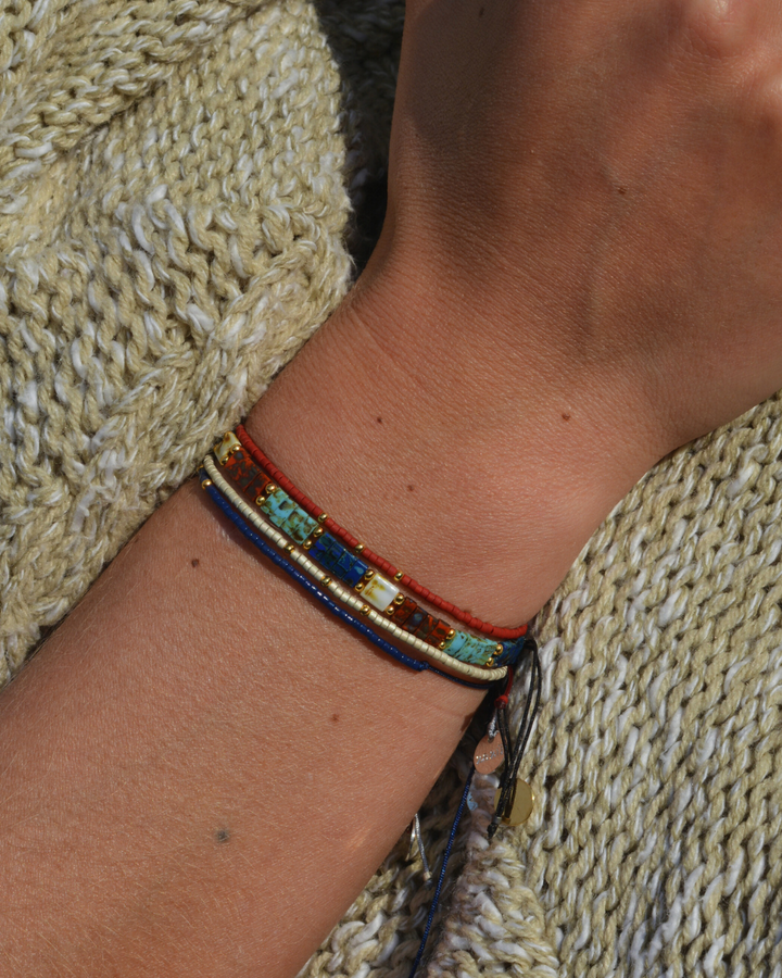 Pulsera Marfil con mostacillas bañadas en oro