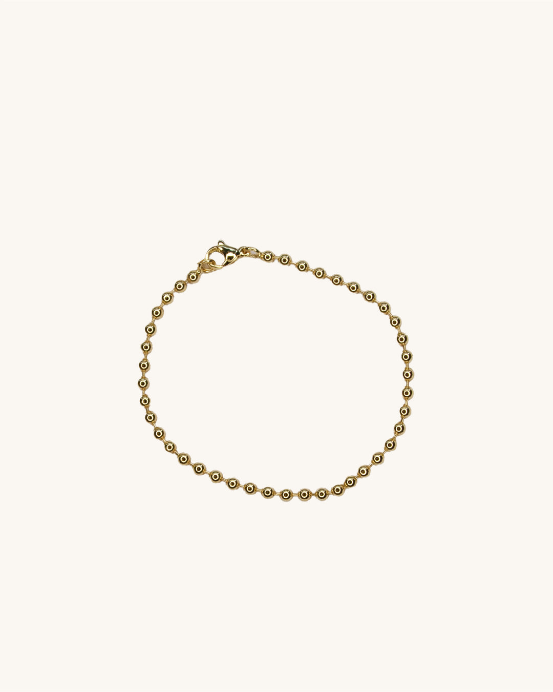 Pulsera Pelotitas Bañada en Oro