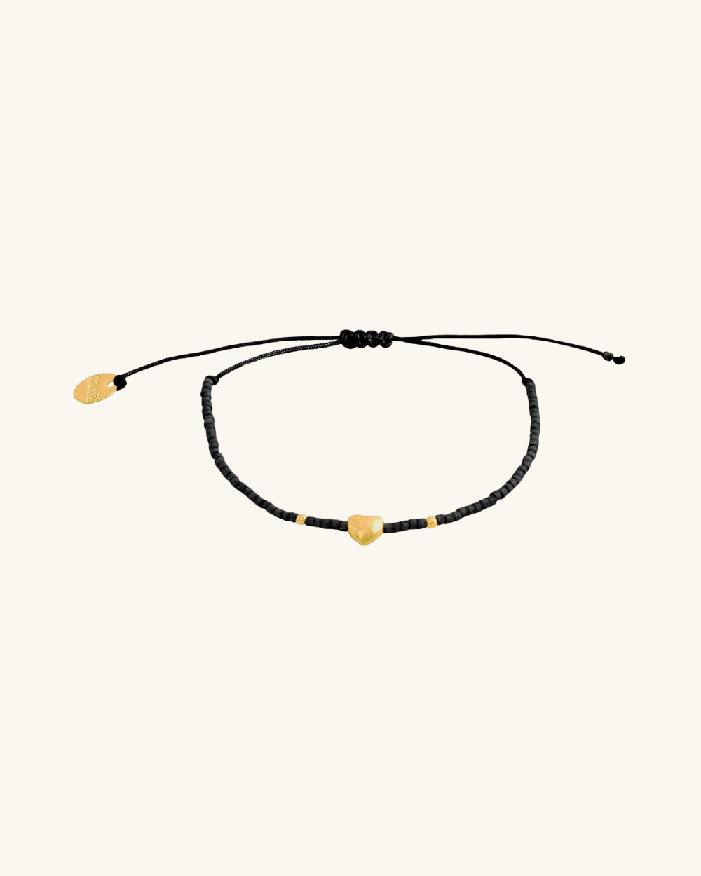 Pulsera Negra Corazón Bañado en Oro