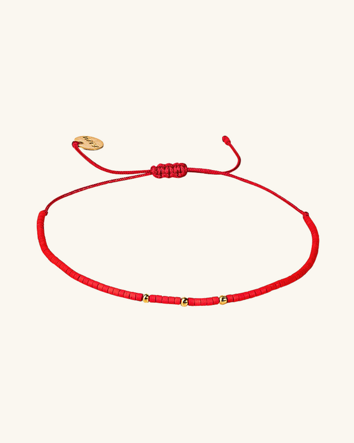 Pulsera Roja con Mostacillas Bañadas en Oro