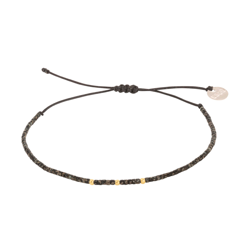Pulsera Negra Picasso con Mostacillas de Plata Bañadas en Oro