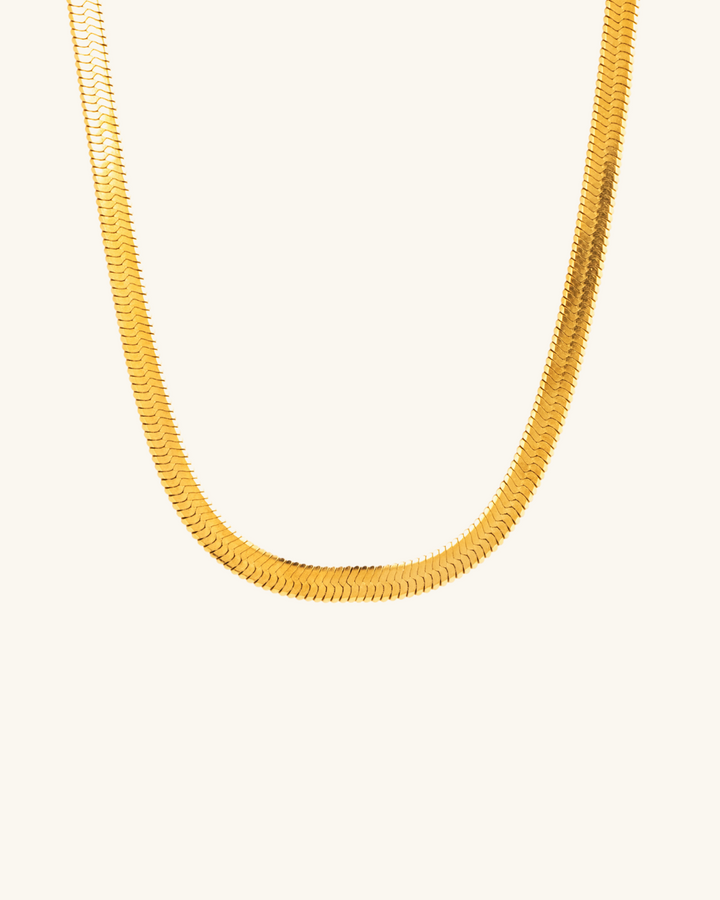 Collar Cinta Gruesa de Acero Bañado en Oro