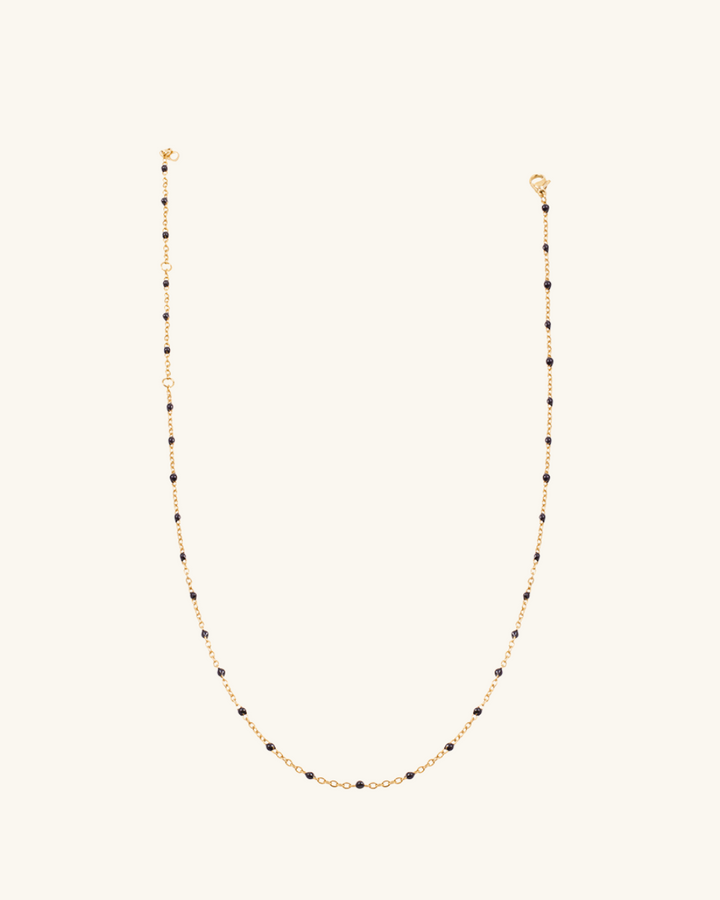 Collar Tama Negro de Acero Bañado en Oro