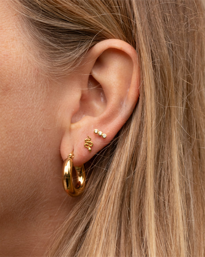 Piercing  Reptil Bañado en Oro