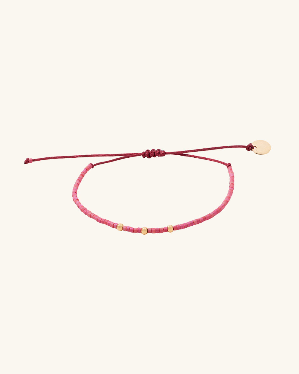 Pulsera Coral con Mostacillas Bañadas en Oro