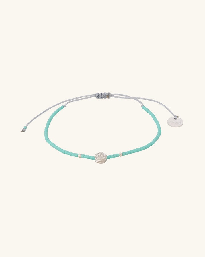 Pulsera Celeste con Rosa y Mostacillas de Plata