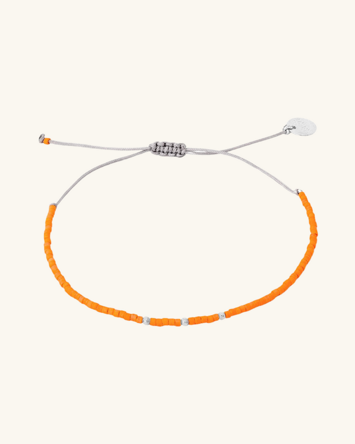 Pulsera Naranja con Mostacillas de Plata