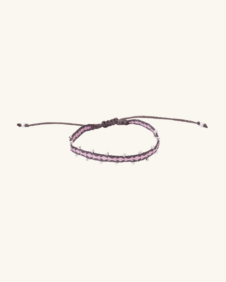 Pulsera Telar Fina Gris y Rosado con Mostacillas de Plata al Lado