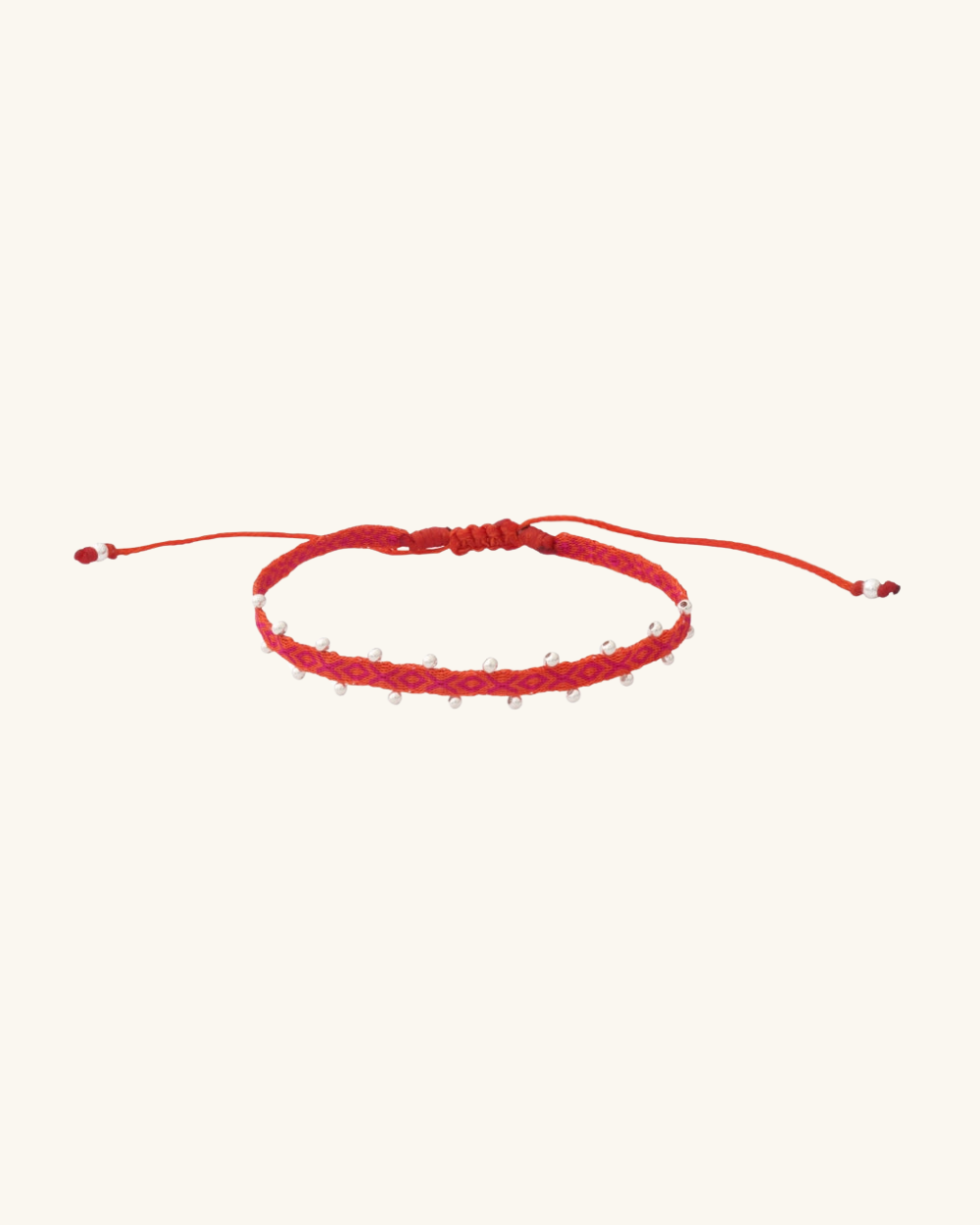 Pulsera Telar Fina Naranjo y Coral con Mostacillas de Plata al Lado