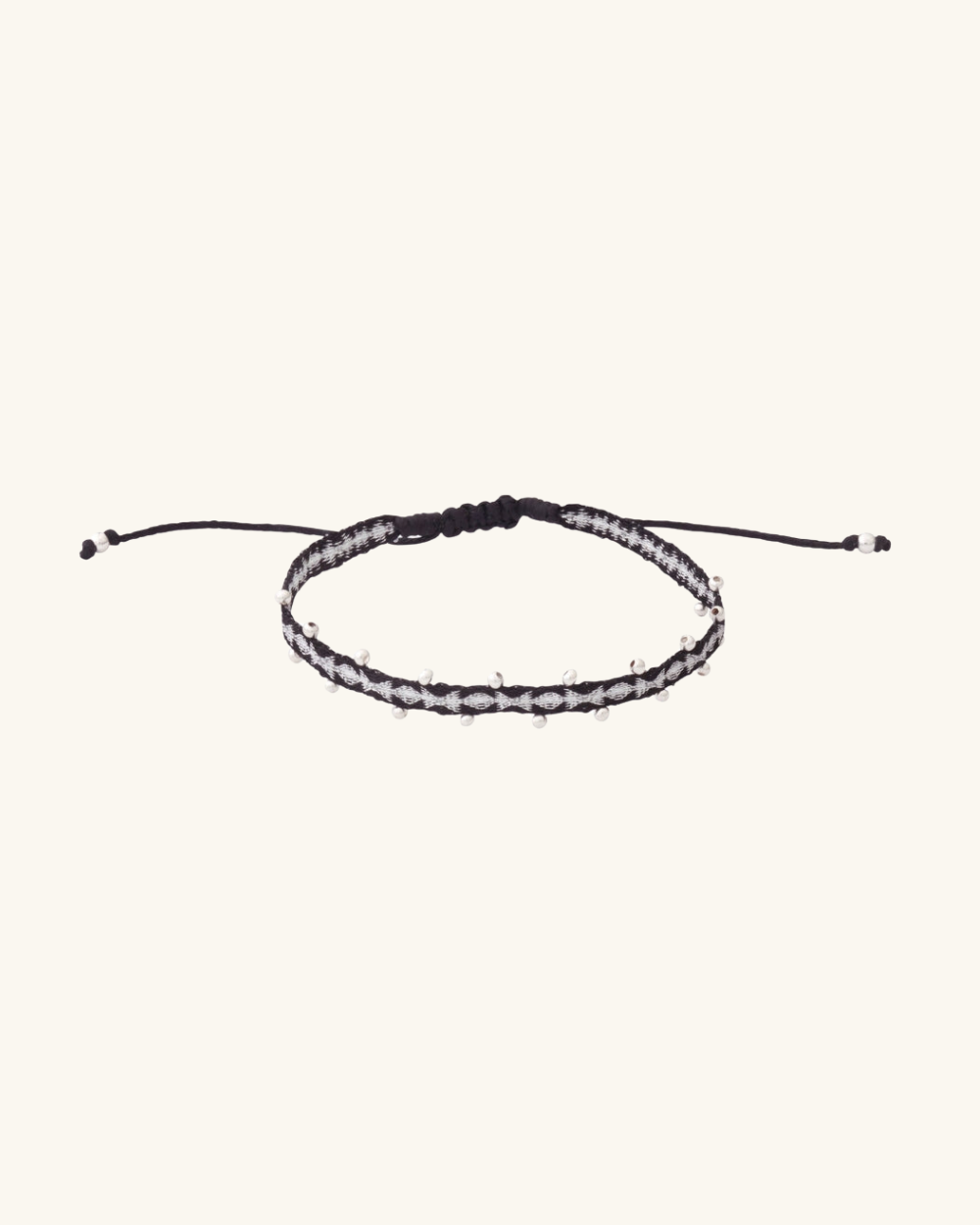 Pulsera Telar Fina Negra y Plata con Mostacillas de Plata al lado