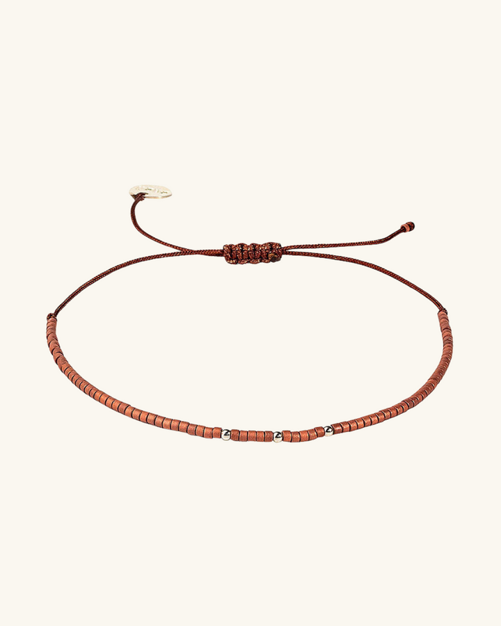 Pulsera cobre con mostacillas de plata